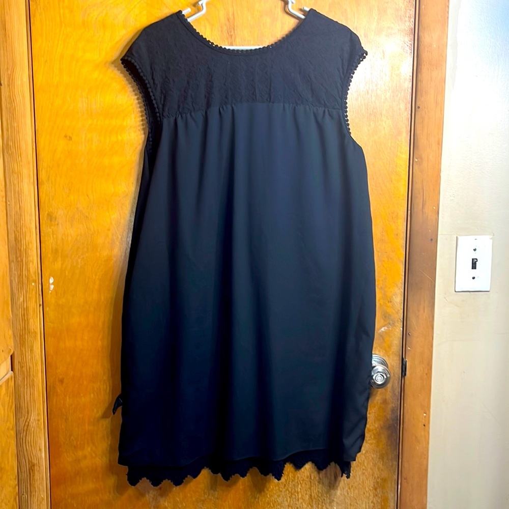 Black shift dress. Lace too with tie back closure
